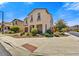 Inviting two-story home with lush landscaping, providing a welcoming curb appeal at 6503 E Bluefield Ave, Phoenix, AZ 85054