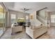 Open concept living room with comfortable seating and lots of natural light at 6503 E Bluefield Ave, Phoenix, AZ 85054