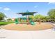 Vibrant community playground with slides, climbing structures, and ample space for to play at 6503 E Bluefield Ave, Phoenix, AZ 85054