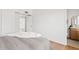 Bright bedroom with access to ensuite bath and plenty of natural light at 6863 W Sunnyside Dr, Peoria, AZ 85345