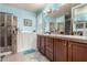 A modern bathroom featuring a walk-in bathtub and updated cabinetry, along with tiled walls and modern fixtures at 7015 W Melody Dr, Laveen, AZ 85339