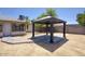 Backyard gazebo with a patio perfect for outdoor seating and relaxation at 722 W Topeka Dr, Phoenix, AZ 85027