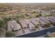 An aerial view showing the community layout and single-Gathering homes, each with tile roofs at 8433 E Leonora St, Mesa, AZ 85207