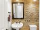 Tastefully designed bathroom with a stylish mirror, mosaic tile, and vessel sink at 8433 E Leonora St, Mesa, AZ 85207