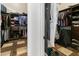 Spacious walk-in closet with custom shelving and organization systems for optimal storage at 8433 E Leonora St, Mesa, AZ 85207
