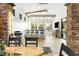Bright dining area with a breakfast bar overlooking the yard, and decorative stone accents at 8433 E Leonora St, Mesa, AZ 85207