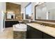 Luxurious main bathroom with a soaking tub, stone accents, and dual vanities at 8433 E Leonora St, Mesa, AZ 85207
