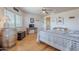 Comfortable bedroom with a wood floor and a decorative barrel accent at 8606 E Arroyo Seco Rd, Scottsdale, AZ 85266