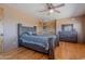Well-appointed bedroom boasts hardwood floors, a ceiling fan, and ample closet space at 8606 E Arroyo Seco Rd, Scottsdale, AZ 85266