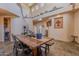Large open concept dining room with views to the second story at 8606 E Arroyo Seco Rd, Scottsdale, AZ 85266