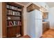 Well-organized kitchen with an adjacent bookshelf offers both function and charm at 8606 E Arroyo Seco Rd, Scottsdale, AZ 85266