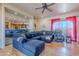 Open-concept living room with hardwood floors and access to the kitchen at 8606 E Arroyo Seco Rd, Scottsdale, AZ 85266
