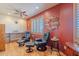 Sitting room with beautiful views, hardwood floors, and comfortable seating at 8606 E Arroyo Seco Rd, Scottsdale, AZ 85266