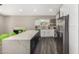 A kitchen with a large island and sleek appliances at 8829 W Sheridan St, Phoenix, AZ 85037