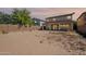 Backyard featuring a block fence and ready for landscaping at 950 E Kelsi Ave, San Tan Valley, AZ 85140