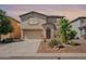 Inviting two-story home featuring a neutral color scheme and a spacious two car garage at 950 E Kelsi Ave, San Tan Valley, AZ 85140