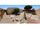 Backyard with gravel, trees, rocks, and stone pavers at 10951 N 91St Ave # 16, Peoria, AZ 85345