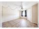 Bright bedroom featuring tile flooring and a ceiling fan at 10951 N 91St Ave # 16, Peoria, AZ 85345