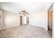 Open bedroom with plush carpet and neutral walls at 10951 N 91St Ave # 16, Peoria, AZ 85345