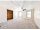 Cozy bedroom with plush carpet and natural light at 10951 N 91St Ave # 16, Peoria, AZ 85345