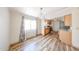 Eat-in kitchen with wood floors and natural light at 10951 N 91St Ave # 16, Peoria, AZ 85345