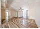Open-concept living room with wood floors and natural light, ideal for gatherings at 10951 N 91St Ave # 16, Peoria, AZ 85345