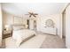 Spacious main bedroom boasts a ceiling fan, a walk-in closet, and neutral décor at 10951 N 91St Ave # 16, Peoria, AZ 85345