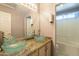 Updated bathroom featuring vessel sinks and updated countertops and lighting at 11526 W Bermuda Dr, Avondale, AZ 85392
