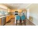 Well-equipped kitchen with a large island, stainless steel appliances, and granite countertops at 11526 W Bermuda Dr, Avondale, AZ 85392