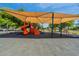 A fun-filled community playground with slides, climbing structures, and swings at 11526 W Bermuda Dr, Avondale, AZ 85392