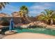Enjoy the refreshing pool with its tranquil waterfall feature, perfect for hot summer days at 11526 W Bermuda Dr, Avondale, AZ 85392