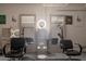Salon featuring stylish decor, chairs, mirrors and lighting at 11526 W Bermuda Dr, Avondale, AZ 85392