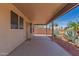 Covered patio with view of the desert landscape, perfect for outdoor relaxation and entertaining at 11543 W Sandsnake Ct, Surprise, AZ 85378