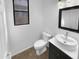 Cozy bathroom with vessel sink and dark colored vanity at 13335 W Marlette Ct, Litchfield Park, AZ 85340