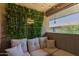 Cozy balcony area decorated with lush greenery and comfortable seating at 1402 E Guadalupe Rd # 234, Tempe, AZ 85283