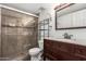 Well-appointed bathroom featuring a tiled walk-in shower and granite vanity at 1402 E Guadalupe Rd # 234, Tempe, AZ 85283