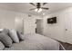 Comfortable bedroom featuring a ceiling fan, tv, and neutral color palette at 1402 E Guadalupe Rd # 234, Tempe, AZ 85283