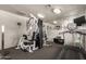 Well-equipped gym area with an array of exercise machines and mirrored wall at 1402 E Guadalupe Rd # 234, Tempe, AZ 85283