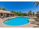 Community pool area, with lounge chairs, landscaped surroundings, and a refreshing escape on warm days at 1402 E Guadalupe Rd # 234, Tempe, AZ 85283
