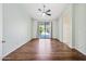 Bright bedroom with wood floors and backyard views at 14717 N 97Th Pl, Scottsdale, AZ 85260