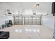 Spacious two car garage with automatic door openers and room for storage at 14717 N 97Th Pl, Scottsdale, AZ 85260
