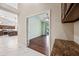 Open entryway with views of the kitchen and bedroom at 14717 N 97Th Pl, Scottsdale, AZ 85260