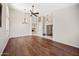 Spacious living room with hardwood floors, high ceilings, and elegant light fixtures at 14717 N 97Th Pl, Scottsdale, AZ 85260