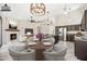 Open floor plan featuring dining area, living room, and kitchen at 14717 N 97Th Pl, Scottsdale, AZ 85260