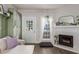 Bright living room with fireplace, modern decor, and ample natural light at 1600 N Saba St # 143, Chandler, AZ 85225