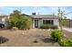 Charming single-story home with desert landscaping and inviting front entrance at 1615 E Roma Ave, Phoenix, AZ 85016