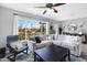 Bright, airy living room featuring a large window offering plenty of natural light at 1615 E Roma Ave, Phoenix, AZ 85016