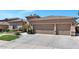 Charming home featuring a two-car garage and landscaped front yard in a sunny neighborhood at 1621 W Wildwood Dr, Phoenix, AZ 85045