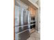 Bright kitchen with stainless steel appliances, wood cabinetry, and modern oven and microwave at 1621 W Wildwood Dr, Phoenix, AZ 85045