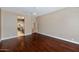 Bright, spacious room featuring hardwood floors and neutral decor at 1621 W Wildwood Dr, Phoenix, AZ 85045